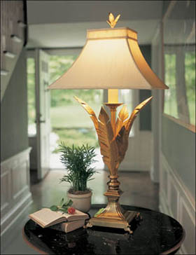 Antiqued brass lamp with leaf motif and square lampshade