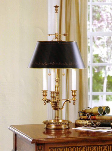 Three light antiqued brass lamp with round base and round lampshade